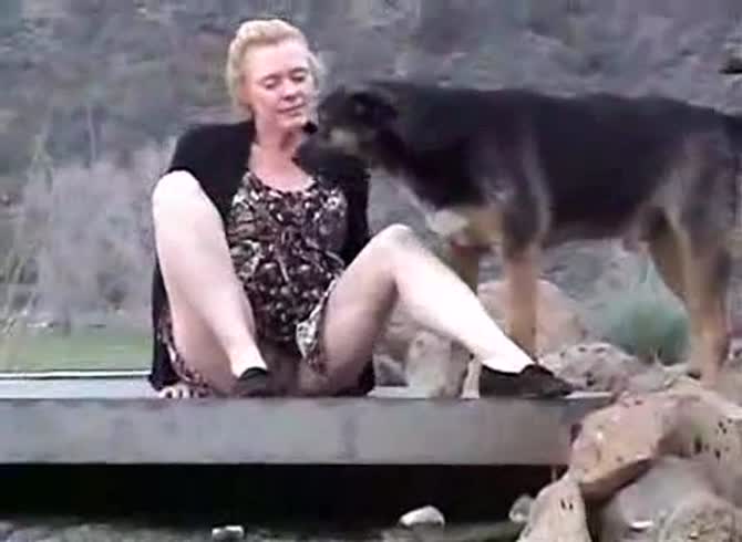 Video :Blonde outdoor dog sex with a k9 animal porno